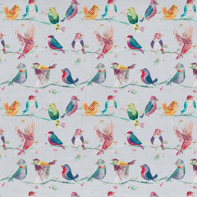 Watercolour bird print on a pale ground with pastel multicolour branches and small perched birds