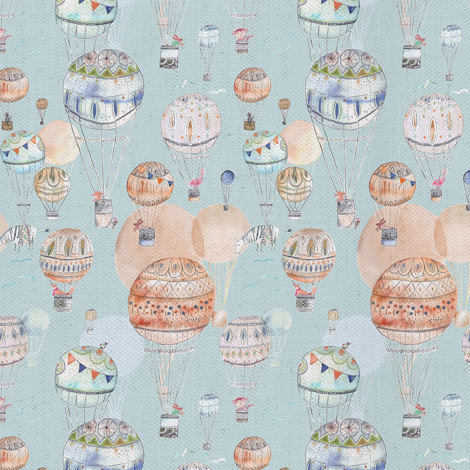 Pale blue fabric with illustrated hot air balloons in soft orange and pastel tones