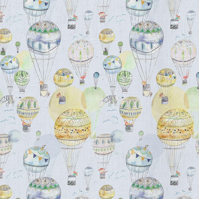 Patterned fabric with yellow hot-air balloons on a pale ground, printed with soft sketchy detail