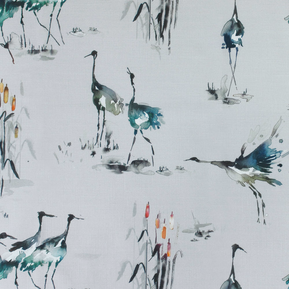 Pale fabric with painterly cranes in teal blue, grey and black