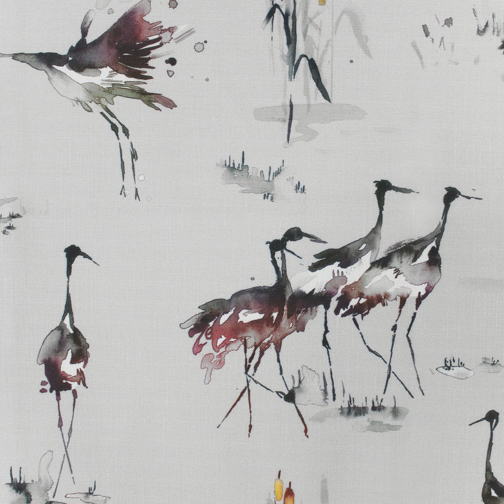 Painterly crane fabric with plum, berry and charcoal birds on a pale ground