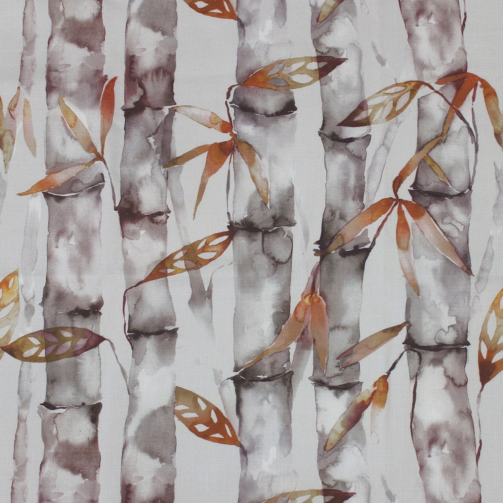 Watercolour bamboo stem fabric with burnt orange leaves on a pale ground