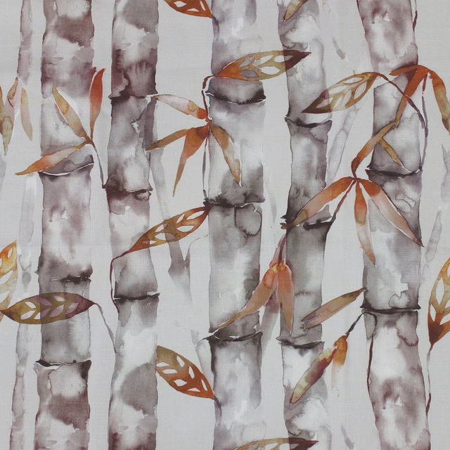 Watercolour bamboo stem fabric with burnt orange leaves on a pale ground