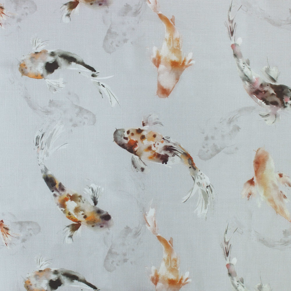 Pale grey fabric swatch with painterly koi fish in coral, black and ochre
