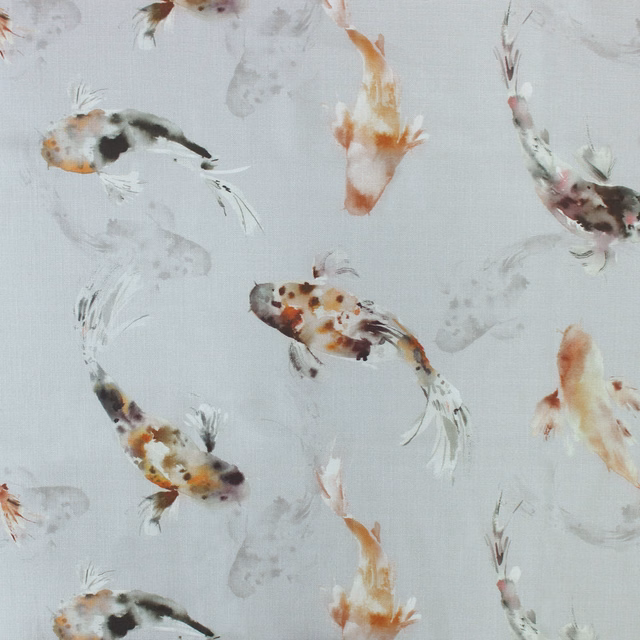 Pale grey fabric swatch with painterly koi fish in coral, black and ochre