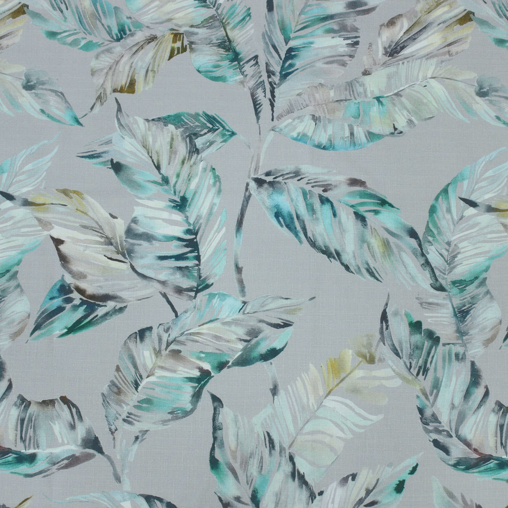Painterly leafy fabric in sage, aqua, grey and charcoal on a pale ground