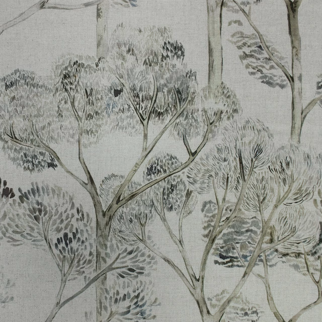 Soft grey botanical fabric with airy tree silhouettes and fine leaf detailing