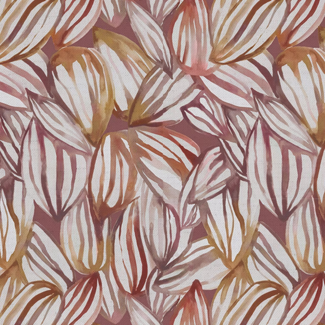 Painterly leaf-pattern fabric in dusty red, ivory, ochre and blush tones