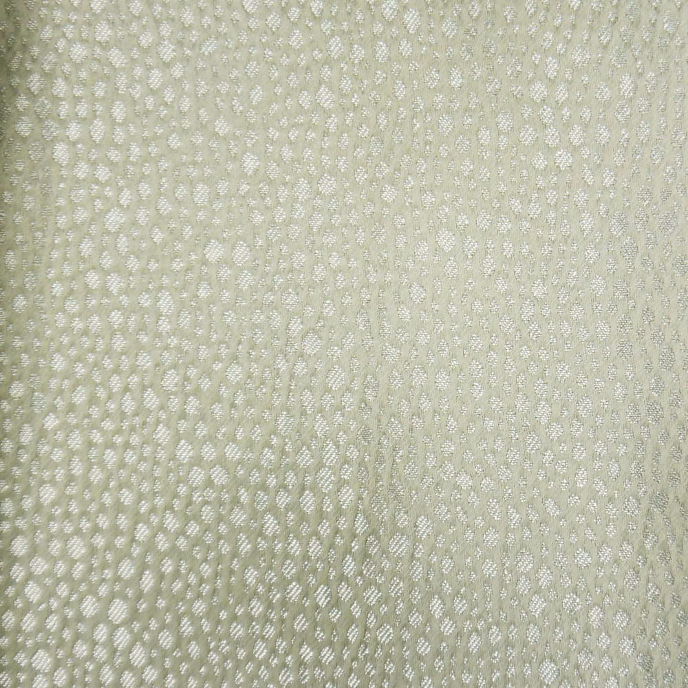 Pale sage-beige textured fabric with a fine dotted woven surface