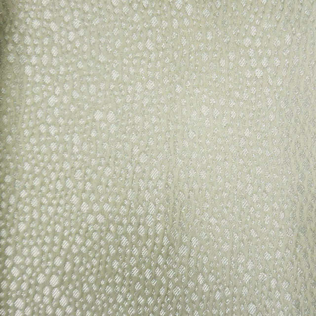 Pale sage-beige textured fabric with a fine dotted woven surface