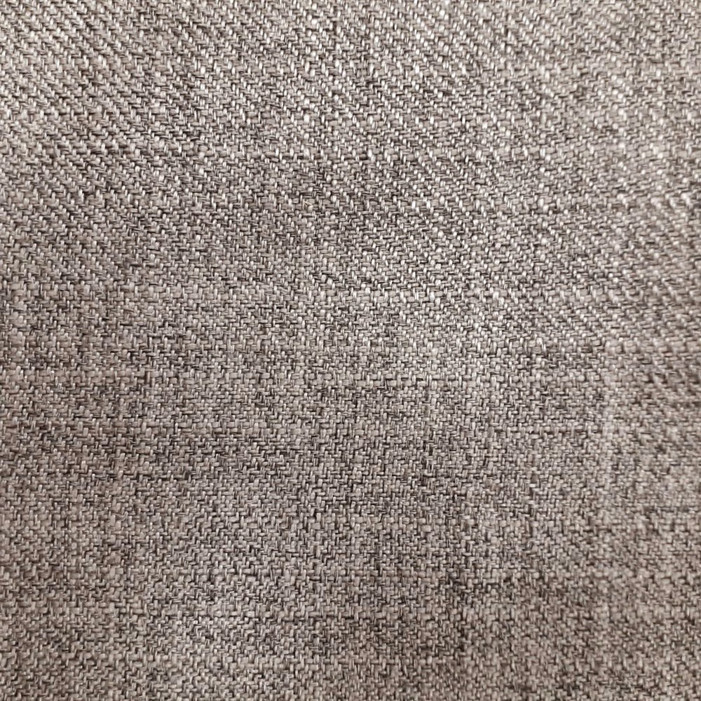 Close-up of warm beige woven upholstery fabric with a fine textured surface