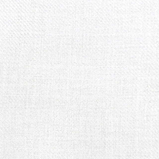Close-up of soft ivory woven fabric with a fine textured surface