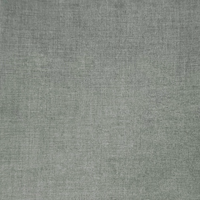 Soft sage-grey plain woven fabric with a fine, dry texture