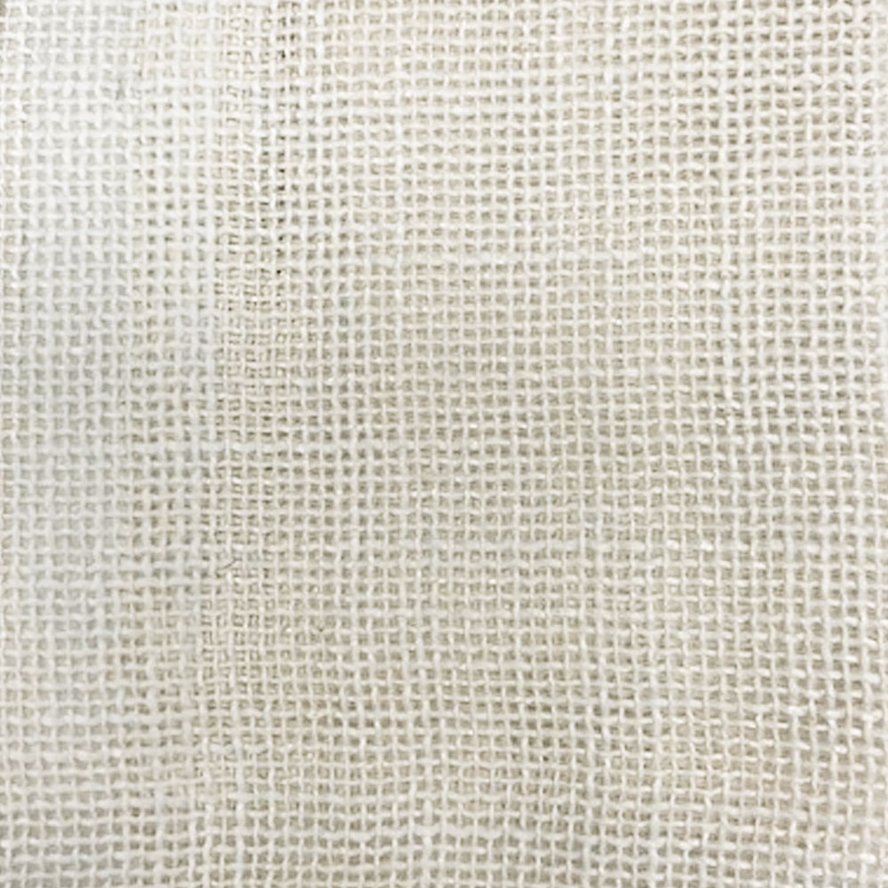 Close-up of a soft warm cream open-weave fabric with a fine grid texture.