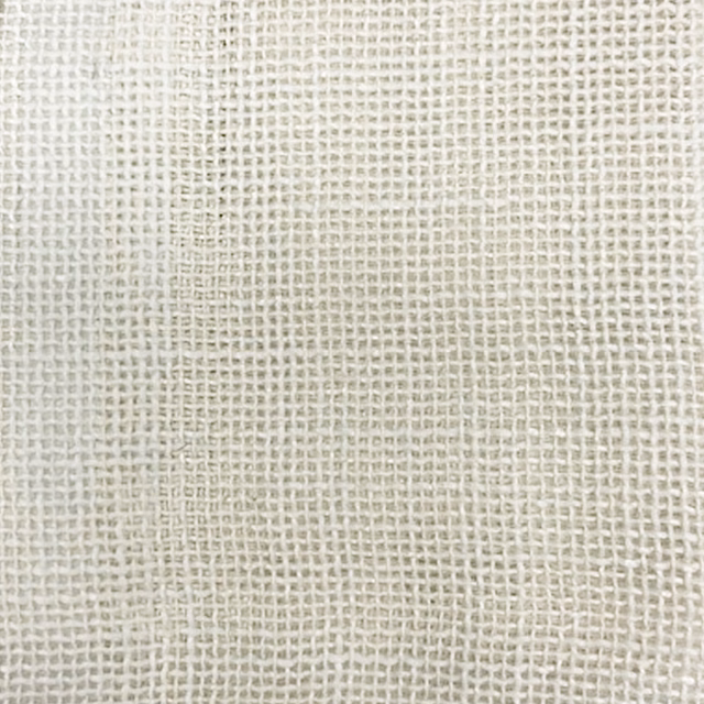 Close-up of a soft warm cream open-weave fabric with a fine grid texture.