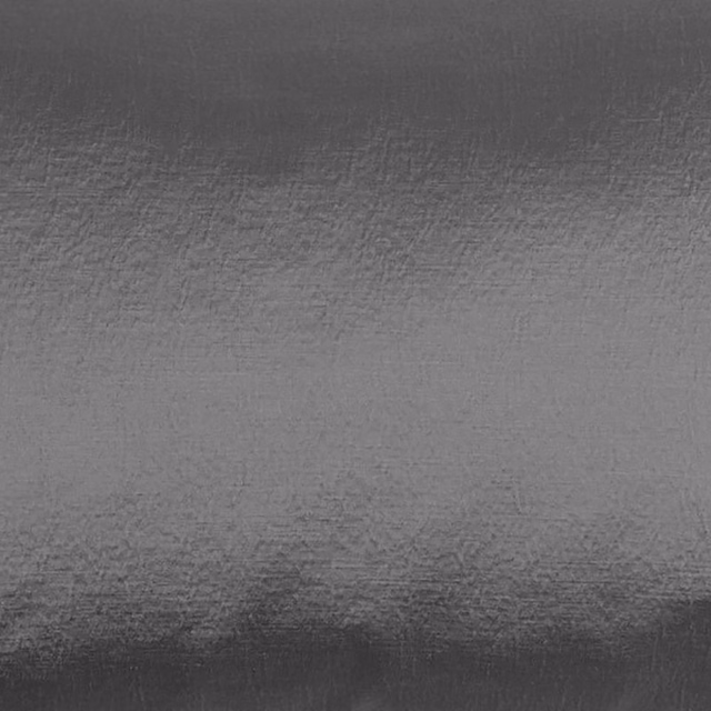 Close-up of a smooth charcoal grey fabric swatch with a soft sheen
