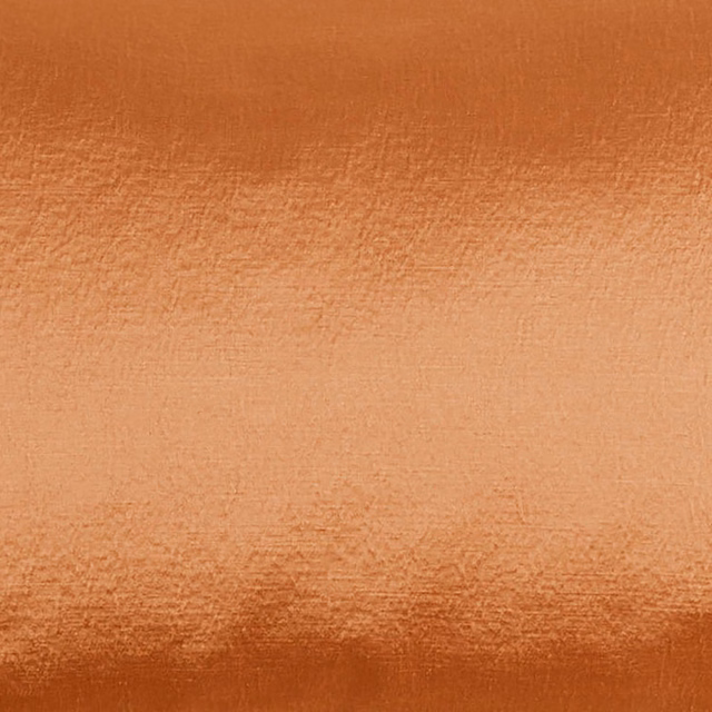 Close-up of glazed orange fabric with a smooth, lightly reflective sheen