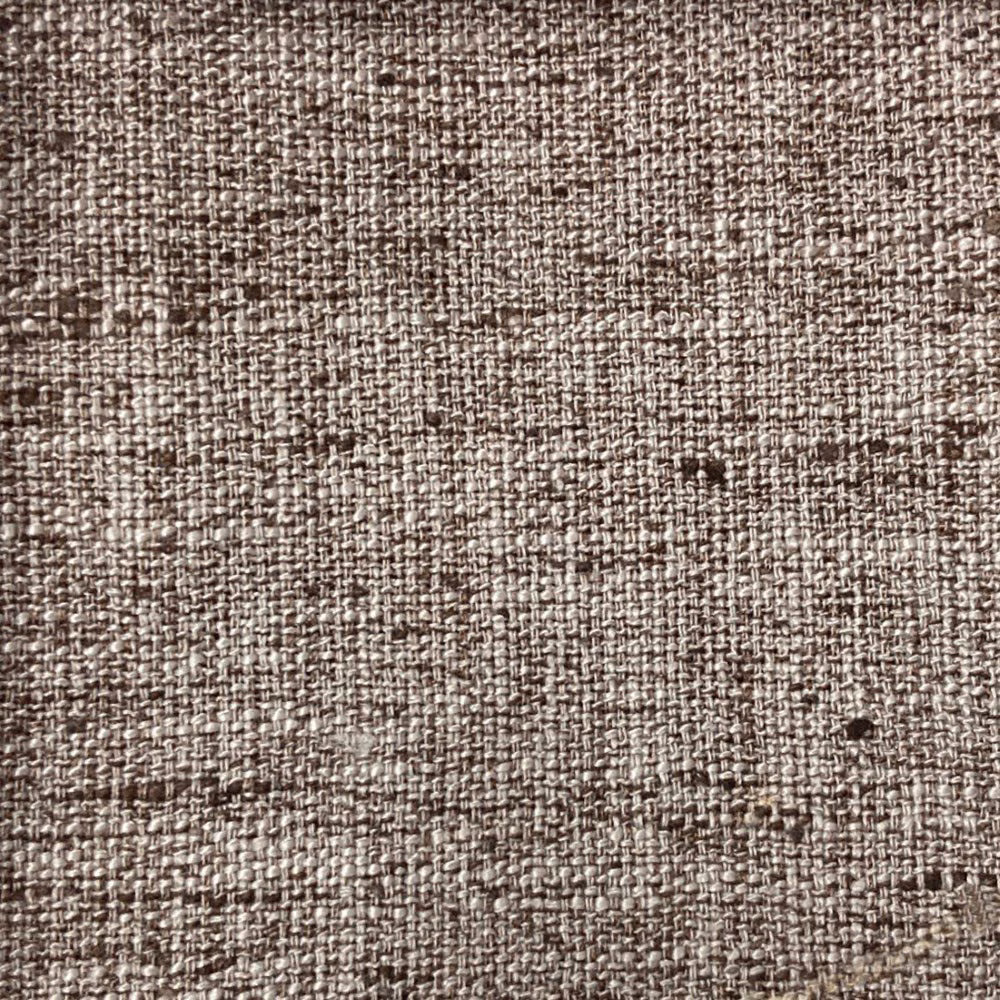 Close-up of warm mushroom-brown woven fabric with subtle flecks and slubbed texture