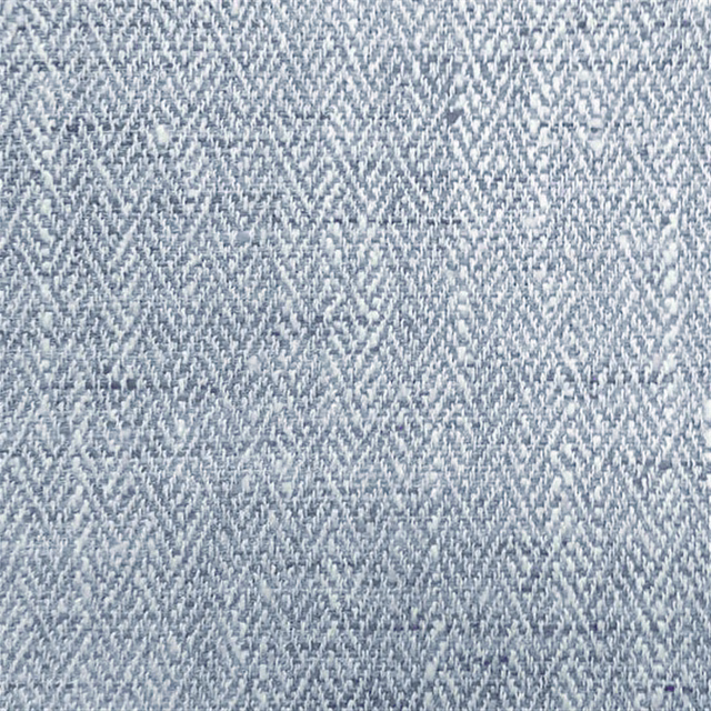 Close-up of soft blue woven check fabric with a fine textured surface