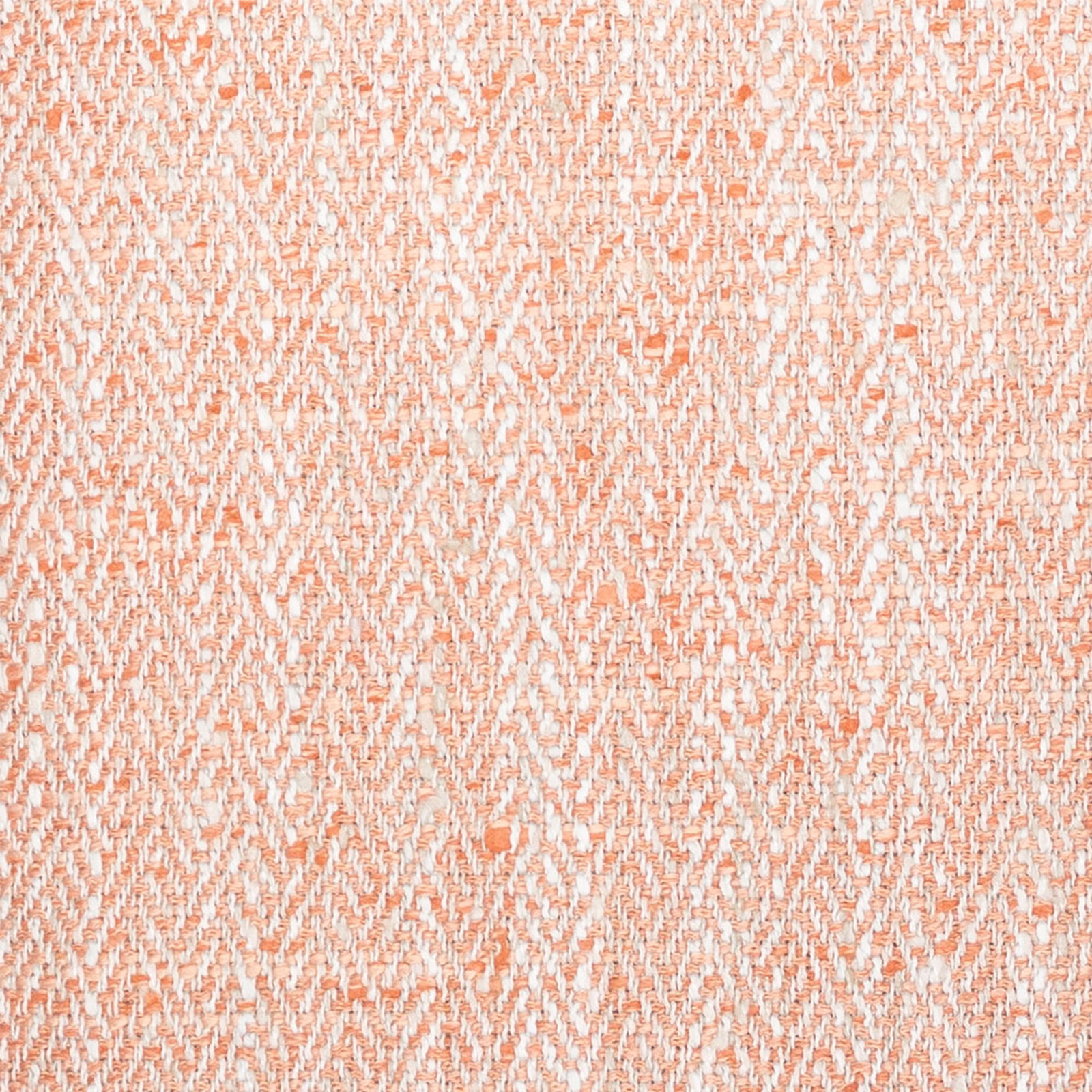 Peach-orange textured woven fabric with white flecked yarns