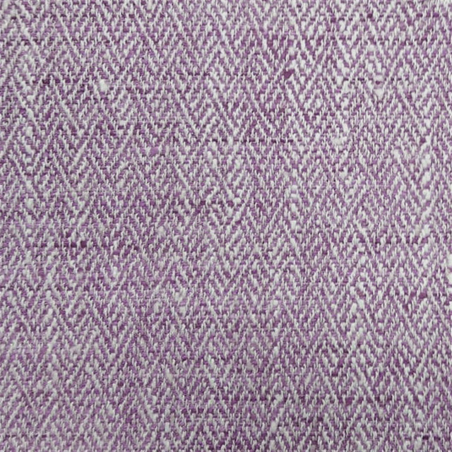 Close-up of lilac purple checked woven fabric with fine herringbone texture