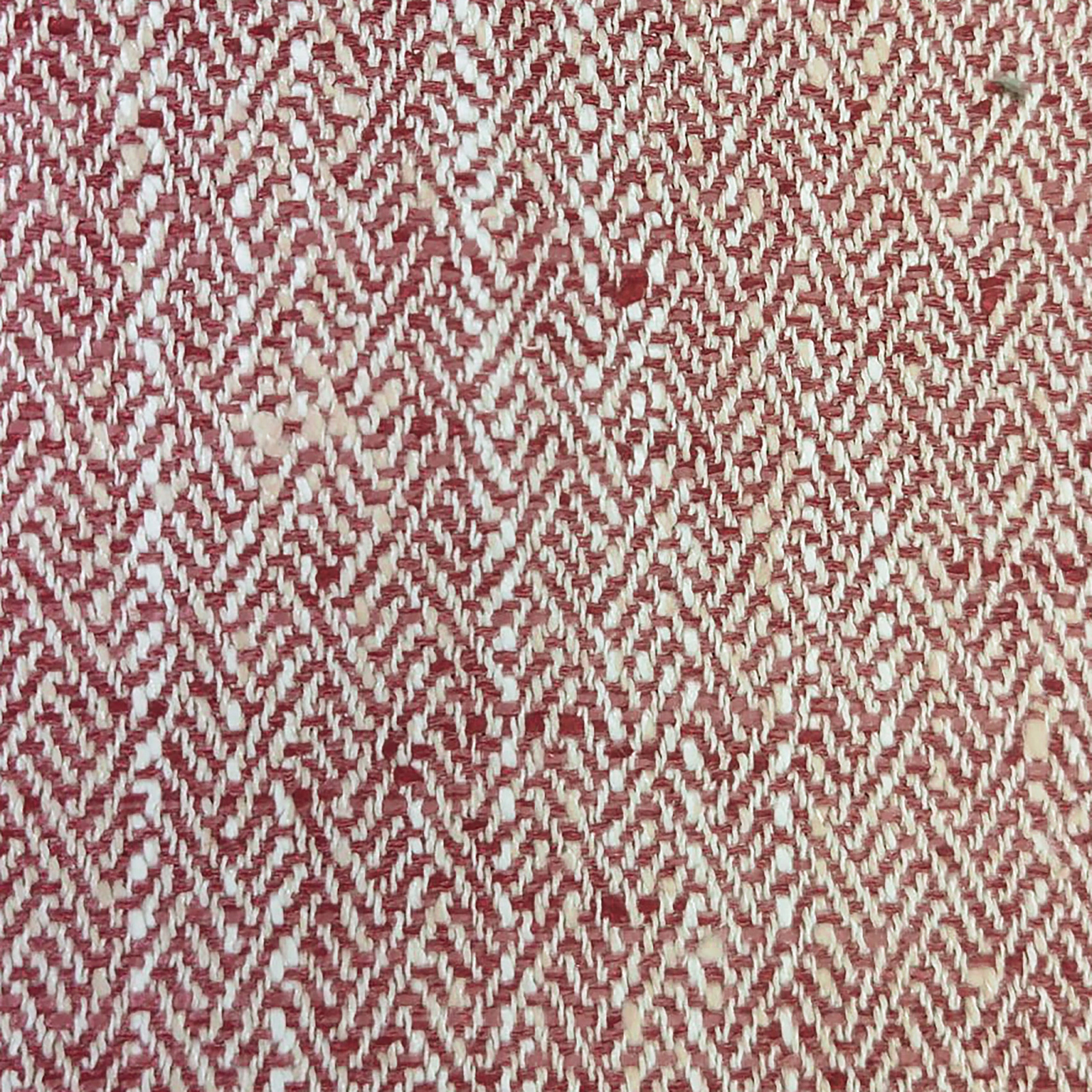 Close-up of a muted raspberry red and cream woven check fabric