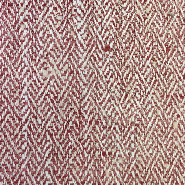 Close-up of a muted raspberry red and cream woven check fabric