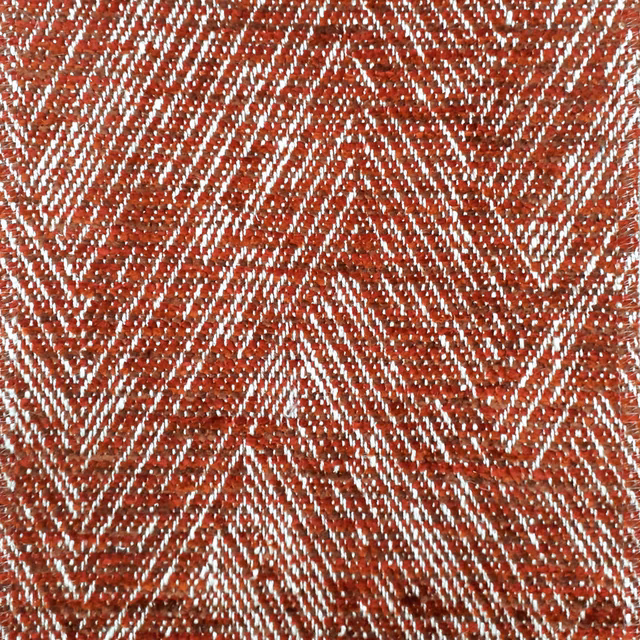 Terracotta herringbone woven fabric with pale zigzag stripes