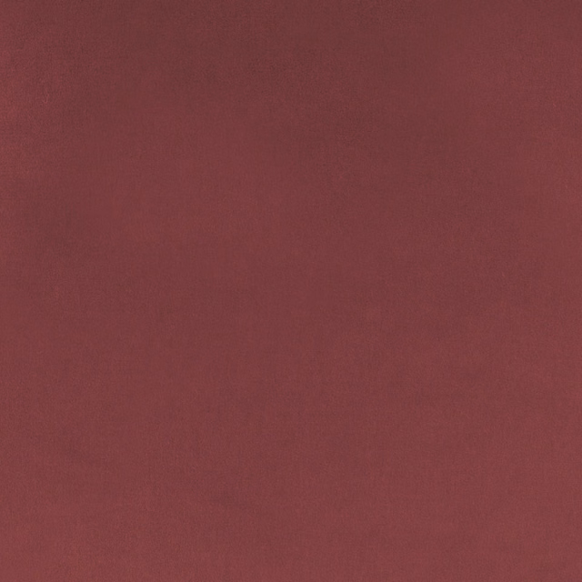 Plain deep red fabric swatch with a soft matte woven finish