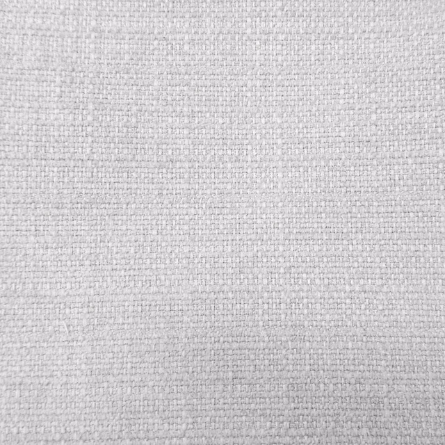 Close-up of soft cream woven fabric with fine textured weave