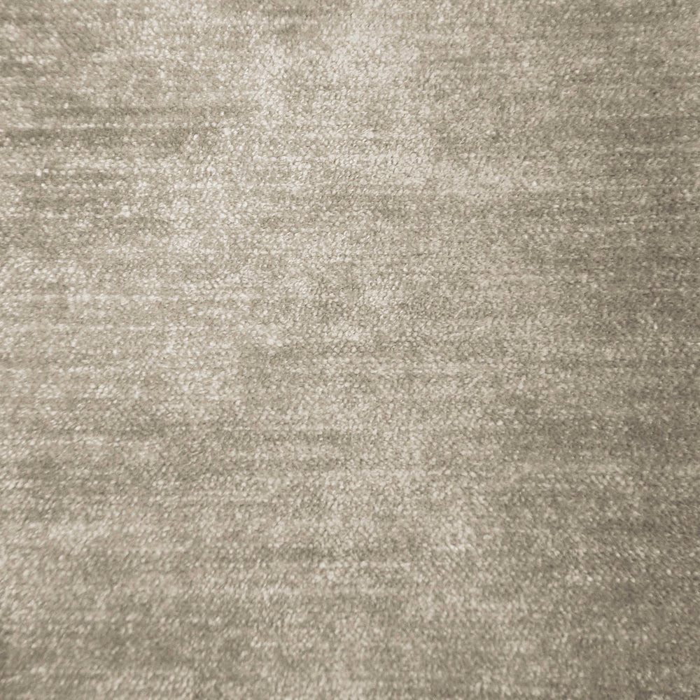 Soft warm beige woven fabric with a subtle lustre and gently mottled texture