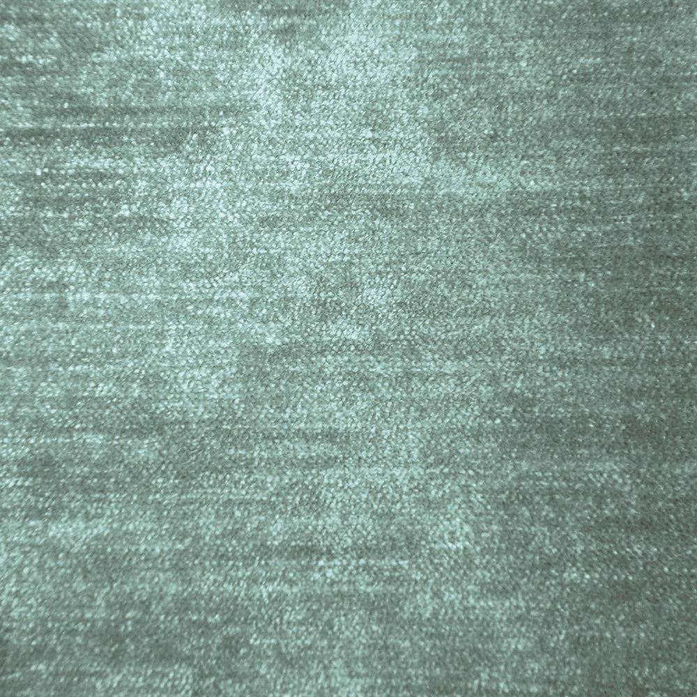 Soft sage-green fabric with a subtle lustre and mottled plain weave