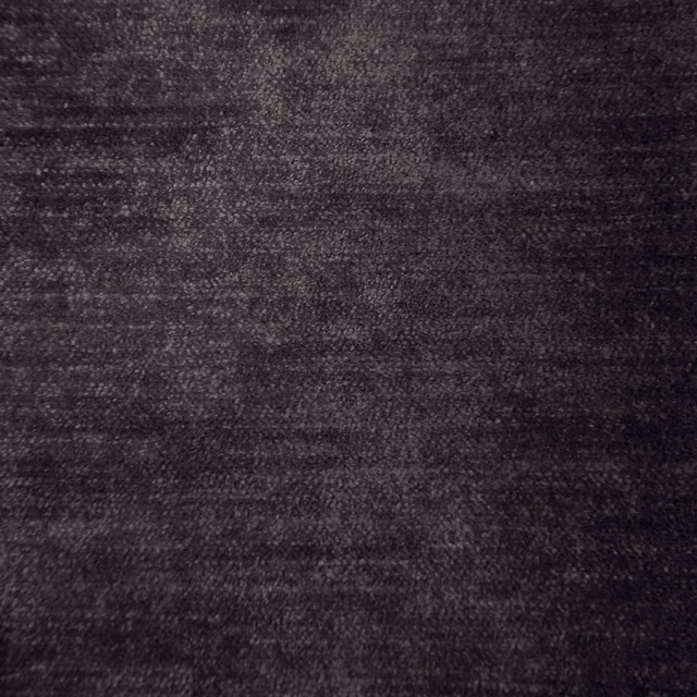 Dark charcoal grey textured fabric swatch with a soft mottled finish