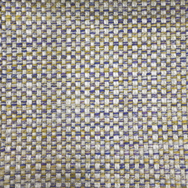 Close-up of a blue, ivory and gold textured basket weave fabric