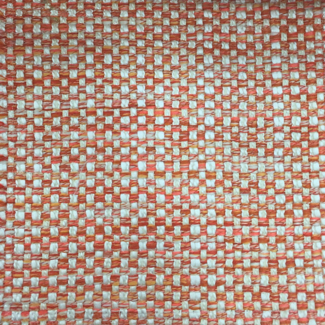 Coral orange and cream basket weave fabric swatch with a textured checker pattern