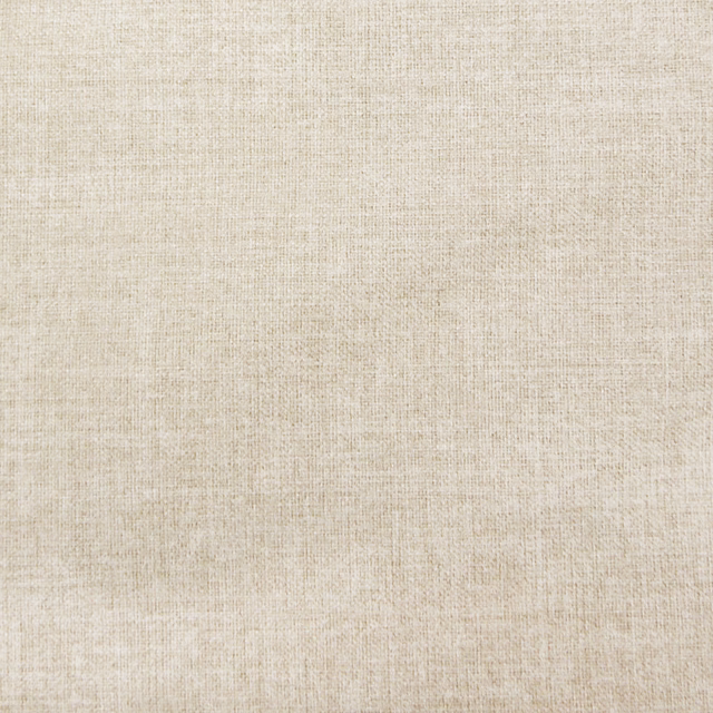 Close-up of warm cream plain woven fabric with subtle linen texture