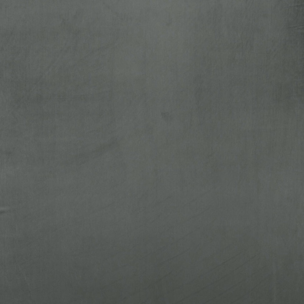 Soft smoky grey plain fabric swatch with a matte brushed texture