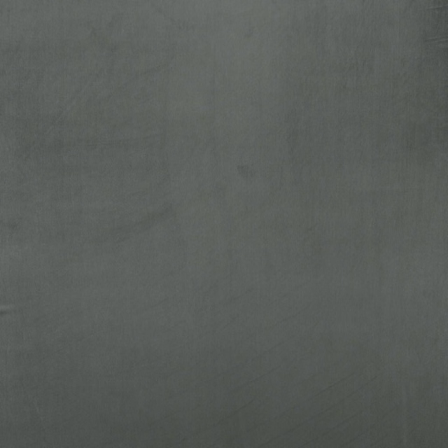Soft smoky grey plain fabric swatch with a matte brushed texture
