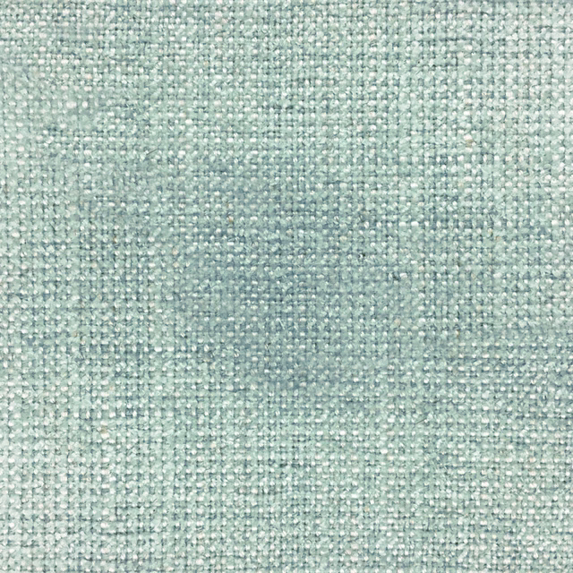 Close-up of soft aqua blue woven fabric with fine textured grain