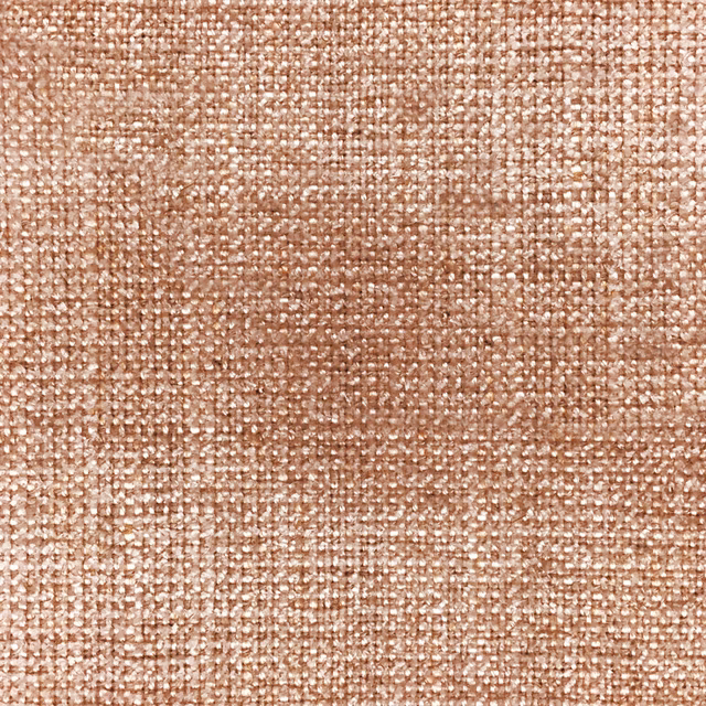 Close-up of softly woven terracotta orange fabric with a slubbed texture