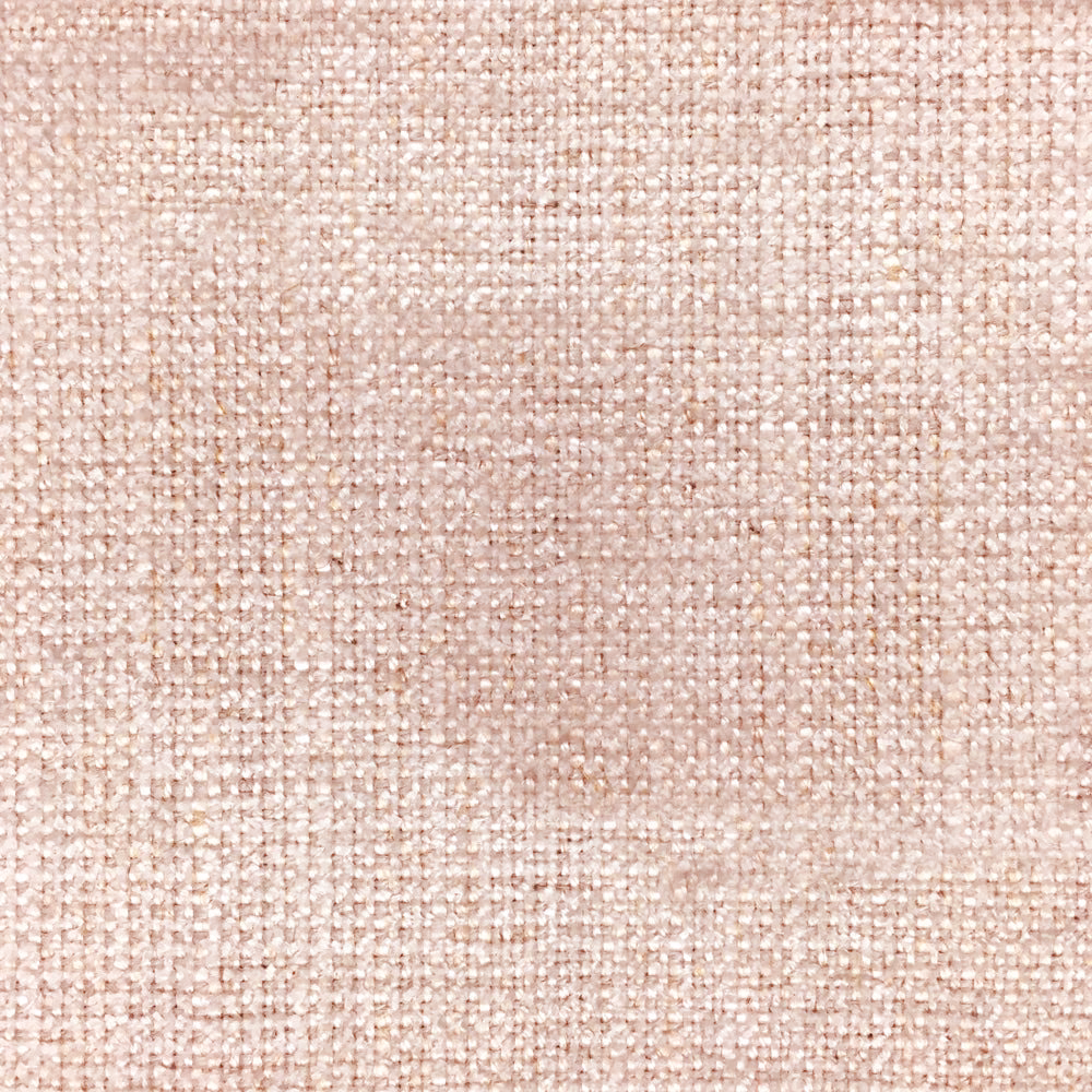 Soft blush pink woven fabric with a fine textured slub surface