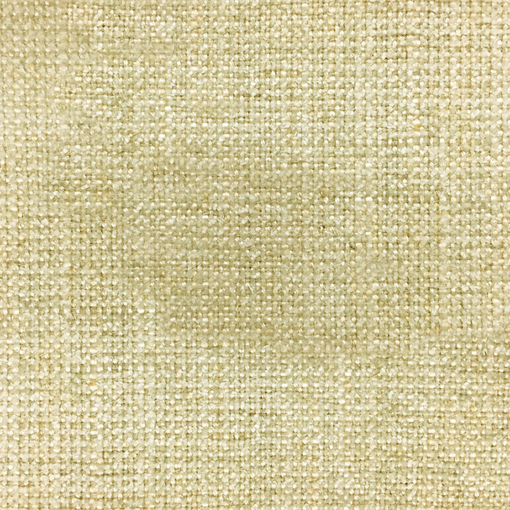 Close-up of softly textured muted yellow woven fabric with cream flecks