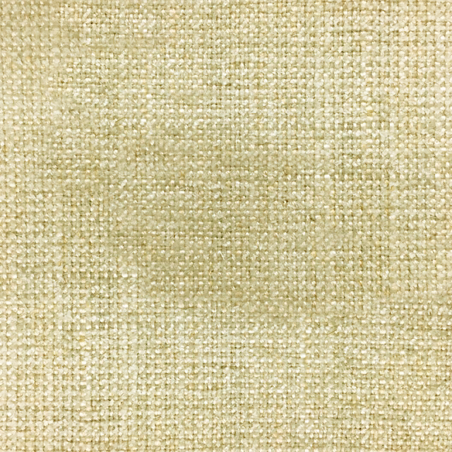 Close-up of softly textured muted yellow woven fabric with cream flecks