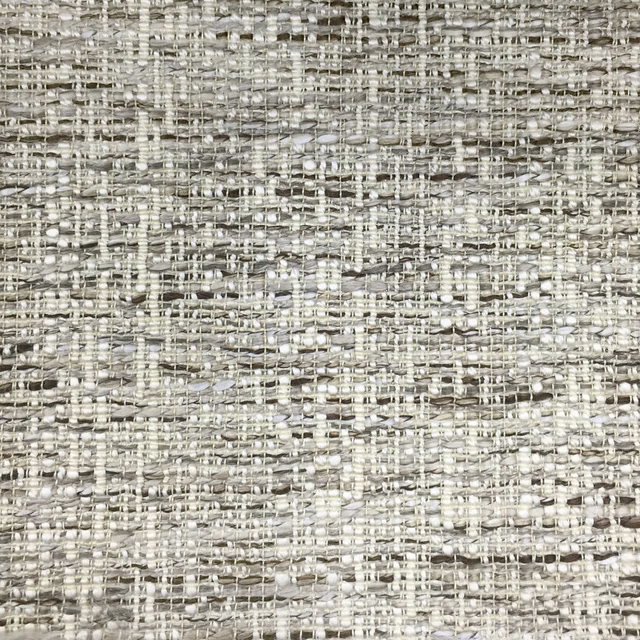 Close-up of a warm brown and stone textured woven fabric with slub yarns