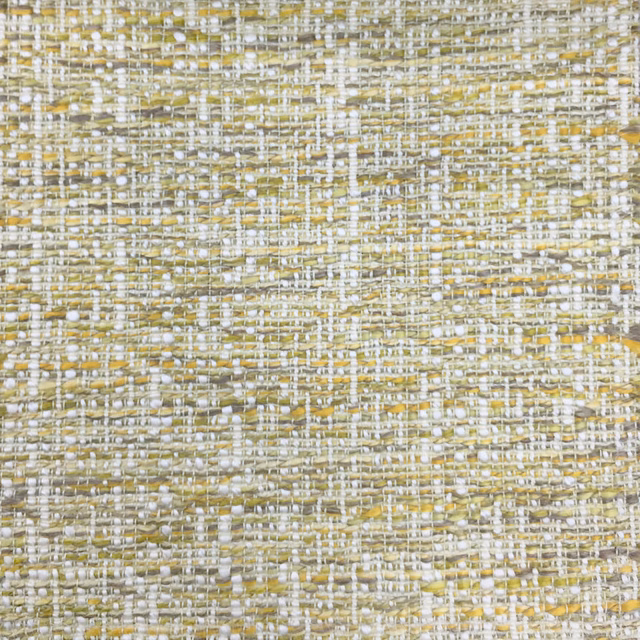Close-up of a softly woven yellow and cream textured fabric swatch