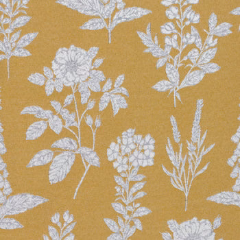 Mustard-gold floral fabric with white botanical leaf and bloom print