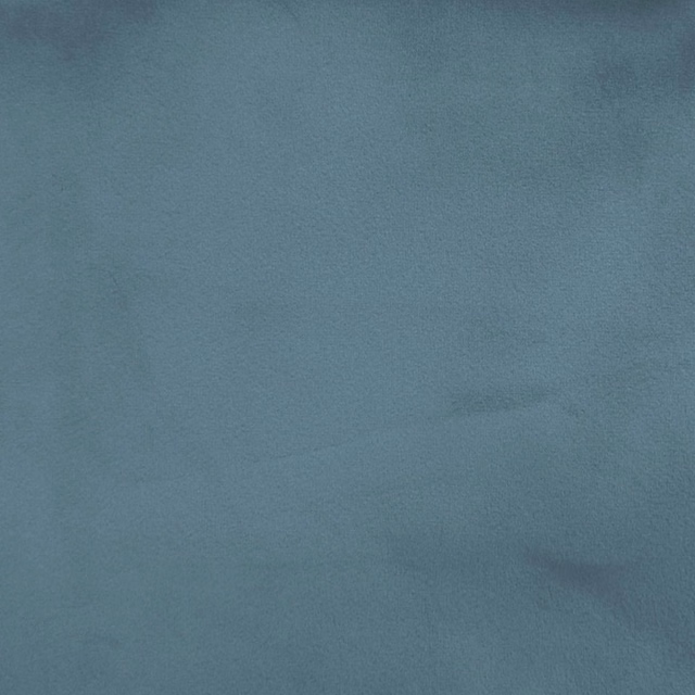 Soft muted blue plain fabric swatch with a smooth matte texture