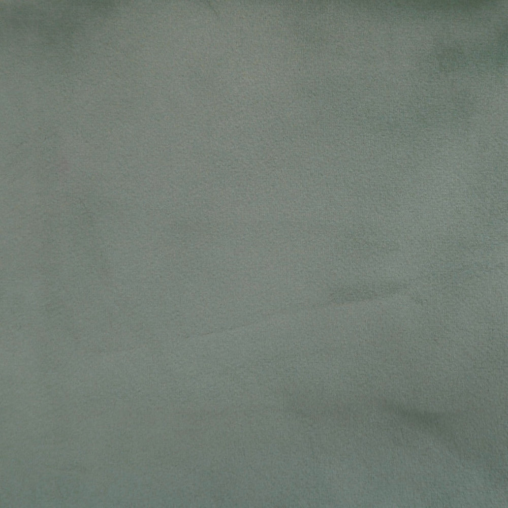 Muted sage green plain fabric with a smooth, softly mottled surface