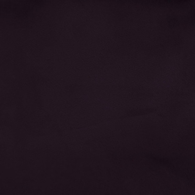 Deep plum purple plain fabric swatch with a smooth matte finish