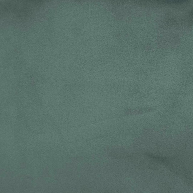 Plain muted sage green fabric swatch with a soft matte finish